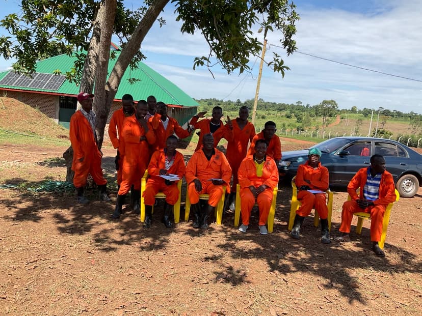 Team member demonstrating farming techniques